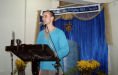 Simon speaking at the English Service
