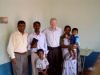 Roger and Simon visit with Pastor Gopi Daniel and family