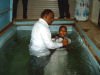 Pastor Jackson baptising people from Pastor Ruby's church