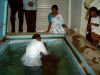 Pastor Jackson baptising people from Pastor Ruby's church