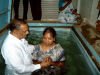 Pastor Jackson baptising people from Pastor Ruby's church