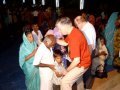 the Team praying for people